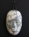 Grey and White Ceramic Mask